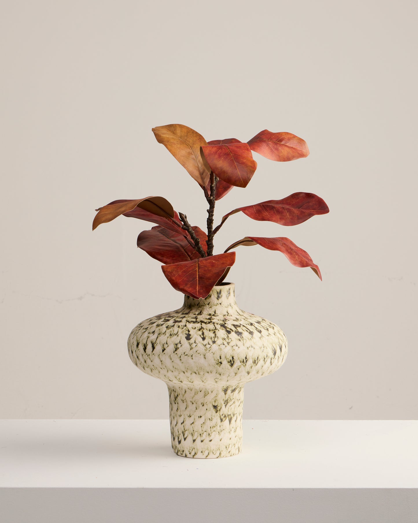 MAGNOLIA BRANCH IN BURNT ORANGE